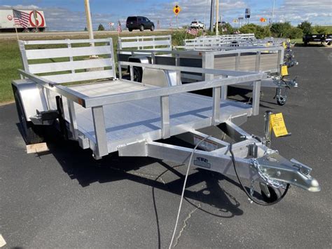 ssure track skid steer trailers|sure trac aluminum trailers.